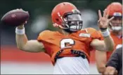  ?? DAVID DERMER — THE ASSOCIATED PRESS ?? Cleveland Browns quarterbac­k Baker Mayfield throws during NFL football training camp Tuesday in Berea, Ohio.