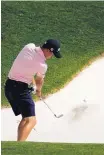  ?? CHARLIE RIEDEL/ASSOCIATED PRESS ?? Justin Thomas hits out of a trap on the 15th hole during a practice round for the PGA Championsh­ip, scheduled to begin today in St. Louis.