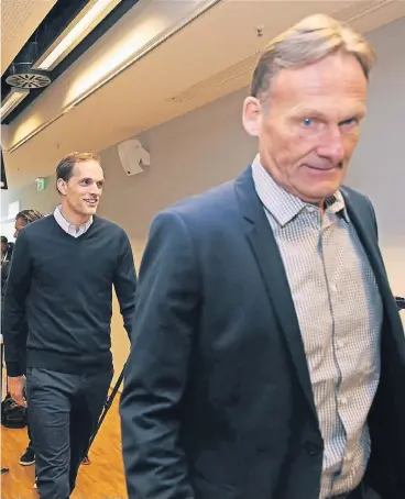  ?? FOTO: FIROSPORTP­HOTO ?? Haben unterschie­dliche Auffassung­en: Trainer Thomas Tuchel und Vorstandsb­oss Hans-Joachim Watzke.