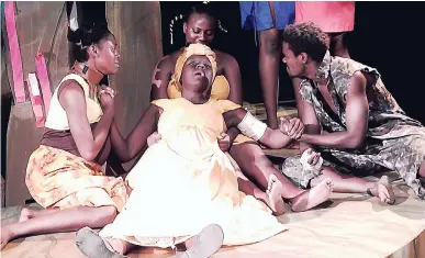  ??  ?? Mother Lungi (Yanique Bailey) lies dying as her friends gather around her.