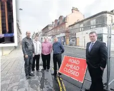  ??  ?? Access required Business representa­tives (from left) Mohammed Asif, Stephen Smart, Cliff Kesley and William Morgan with Coatbridge North councillor Allan Stubbs at the barrier zone