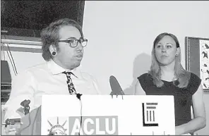  ?? AP/JONATHAN DREW ?? Joaquin Carcano speaks Friday during a news conference in Raleigh, N.C., announcing a new lawsuit over LGBT rights. Carcano and Madeline Goss (right) are plaintiffs in the lawsuit.