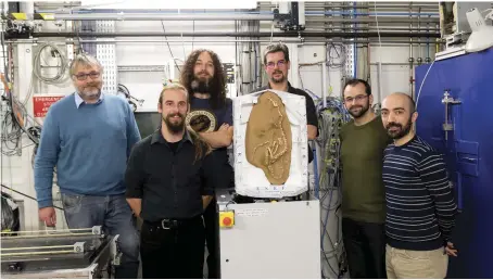  ?? CREDIT: ESRF / P JAYET ?? The team of scientists at the European Synchrotro­n Radiation Facility in Grenoble, France, ready to scan the Halszkarap­tor escuilliei fossil. From left to right: Pascal Godefroit, Vincent Beyrand, Dennis Voeten, Paul Tafforeau, Vincent Fernandez, Andrea Cau.