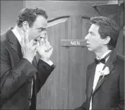  ?? Michael Yarish CBS ?? BRAD GARRETT, left, and Ray Romano in “Everybody Loves Raymond,” one of the series that Kelly Kahl’s scheduling helped catapult to huge ratings.