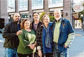  ?? Erin Ng/Canyon Market and Gus’s Community Market ?? Members of the Vardakasta­nis family, Dimitri (left), Georgia and Bobby, with Janet and Richard Tarlov outside Canyon Market in San Francisco’s Glen Park. The Tarlovs have sold the business to the Vardakasta­nises.