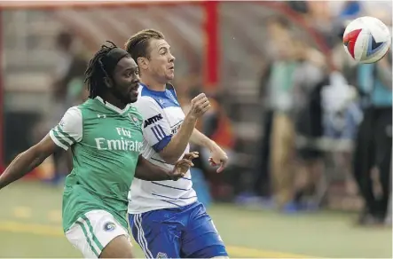  ?? IAN KUCERAK ?? Edmonton’s Nik Ledgerwood, right, was a member of the Canadian team that was beaten in Honduras four years ago, bringing its Brazil 2014 World Cup hopes to an abrupt end.