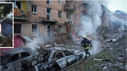  ?? ?? Scene of destructio­n: Footage shows rescuers at work after a Russian attack on Vyshgorod near Kyiv