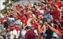  ?? ?? Fans at the game in Mexico City packed the stands to celebrate the launch of Mexico’s profession­al softball league for women. The league is believed to be a first for women in Latin America. Before now, they had to find teams in the United States or Japan.