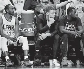  ?? [AP PHOTO] ?? Los Angeles Clippers forward Blake Griffin, center, will be a free agent this summer, one of the many uncertaint­ies facing the team.