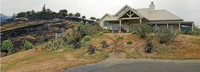  ??  ?? The Redwood Valley home of Guy Mollett who’s home survived the forest fire that started in Pigeon Valley.