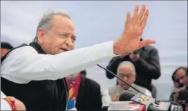  ??  ?? CM Ashok Gehlot interacts with media persons at his residence on the occasion of completion of one year of his government in Rajasthan, in Jaipur on Monday. HIMANSHU VYAS /HT PHOTO