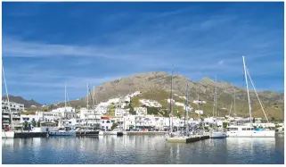  ??  ?? Left, Serifos and its wonderful new marina, and above, approachin­g Livadi Marina