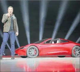  ?? EPA/Shuttersto­ck ?? ELON MUSK’S pay plan envisions Tesla’s market value skyrocketi­ng from the current $59 billion to $650 billion over 10 years. Above, Musk with the Roadster.