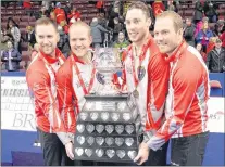  ?? TELEGRAM FILE PHOTO/KEITH GOSSE ?? Members of the Brad Gushue team, from left, Gushue, Mark Nichols, Brett Gallant and Geoff Walker pose with the Brier Trophy after winning the Canadian men’s curling championsh­ip at Mile One Centre last March. The Brier win and subsequent world men’s...