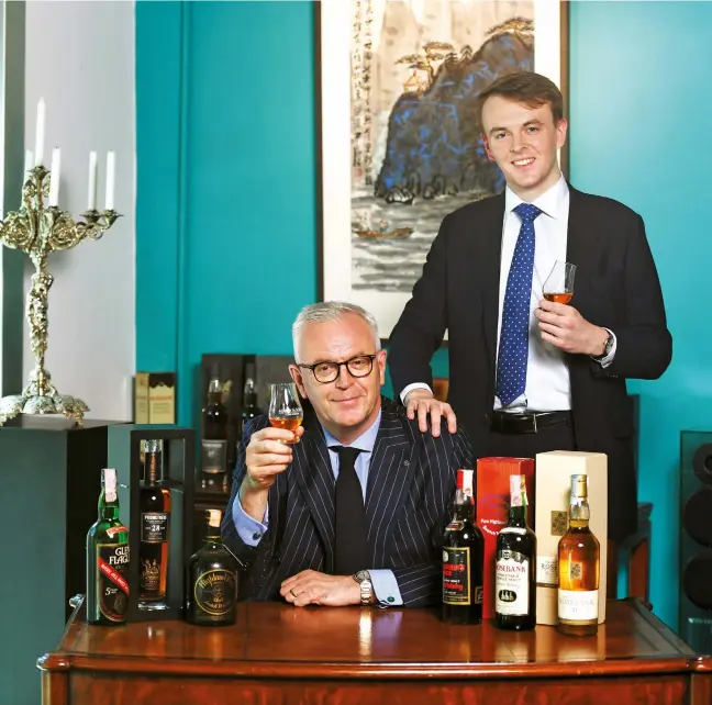  ??  ?? Whisky is a family affair for Jonathan Macey and his son Tom, who own an auction house in Hong Kong
