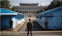  ?? Reuters/Kim Hong-Ji ?? TENSION EASES: South Korean soldiers stand guard at the truce village of Panmunjom inside the demilitari­zed zone (DMZ) separating the two Koreas, South Korea, April 18, 2018.-