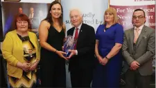  ??  ?? Bríd O’ Sullivan presenting an Adult Club Person Award to Noel Ryan of Kilshannig GAA with committee member Bridie Murphy, Siobhan Murphy,The Corkman, and Pat Whelan of Munster Labels.
