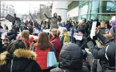  ?? Christian Abraham / Hearst Connecticu­t Media ?? Stephanie Edmonds, with Stamford Parents United, speaks about parent’s rights to anti-mask protesters who gathered in front of the Stamford Government Center Feb. 8.