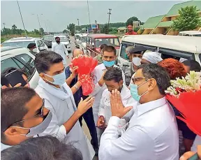  ?? PTI ?? Congress leader Sachin Pilot meets party workers near Uttarakhan­d-UP border in Haridwar on Tuesday. —