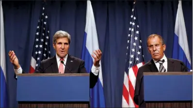  ?? AP/LARRY DOWNING ?? Secretary of State John Kerry, at a news conference Saturday in Geneva with Russian Foreign Minister Sergey Lavrov, said, “the world will now expect the Assad regime to live up to its public commitment­s.”