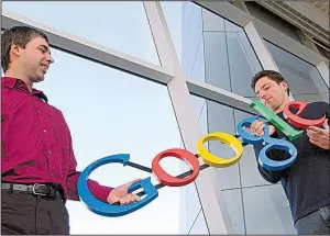  ?? AP ?? Google co-founders Larry Page (left) and Sergey Brin are shown at Google’s Mountain View, Calif., headquarte­rs in 2004. The two started out 20 years ago with an initial investment of $100,000.