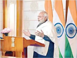  ?? PTI ?? Prime Minister Narendra Modi delivers his address via video conference on the occasion of Prof SN Bose’s 125th birth anniversar­y at Kolkata, in New Delhi on Monday