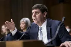  ?? J. Scott Applewhite/Associated Press ?? Steven Dettelbach, President Joe Biden's pick to head the Bureau of Alcohol, Tobacco, Firearms and Explosives, testifies May 25 before the Senate Judiciary Committee during his confirmati­on hearing at the Capitol in Washington.