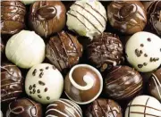  ?? /123rf/Oleg Dudko ?? Cheerful: Boxed chocolates have had a particular­ly strong start to the Christmas season in the UK, Nestlé says.