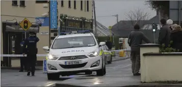  ??  ?? ABOVE AND BELOW: Gardaí at the scene of the hit and run in Kilcoole, which happened in the early hours on Saturday morning.