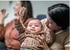  ?? ?? Delgadillo, 25, who is from Honduras, holds her 6-month-old son on Tuesday.