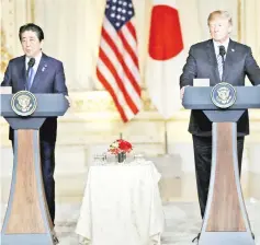  ??  ?? Trump (right) listens as Abe speaks during their joint press conference at Trump’s Mar-aLago estate in Palm Beach, Florida, US. — Reuters photo