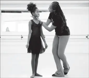  ?? REUTERS/Alishia Abodunde ?? Ruth Essel, 30, founder of Pointe Black Ballet School, and Kioni, 10, rehearse during class in London, Britain, August 4, 2023.