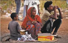  ?? Ashraf Shazly / AFP via Getty Images ?? Ethiopian refugees who fled fighting in the Tigray region gather Thursday at a refugee center in eastern Sudan.