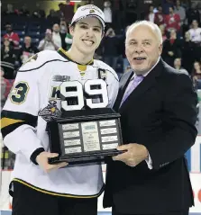  ?? CRAIG GLOVER ?? OHL commission­er David Branch, with current pro Mitch Marner in his OHL days.