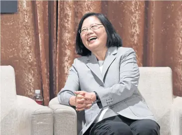  ??  ?? MESSAGE TO BEIJING: Taiwanese President Tsai Ing-wen smiles during a banquet for the annual European Chamber of Commerce (ECCT).