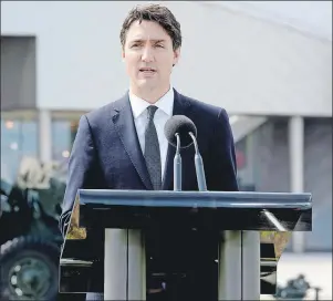  ?? CP PHOTO ?? Prime Minister Justin Trudeau speaks during an availabili­ty at the Juno Beach Centre in Courseulle­s-sur-Mer, France, on Monday.