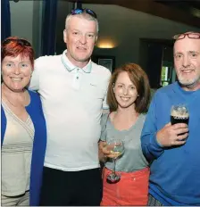  ??  ?? Bar-B-Cue at the Meadowland­s Hotel, for the Chain Gang after cycling the Ring of Kerry in reverse on Saturday, left Liz and Dave Elton, Tralee, Julie Deane, Ballymacel­ligott, and Martin Gill, Manor Village.
Photo: John Cleary