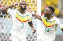  ?? Agence France-presse ?? Senegal’s Kalidou Koulibaly (left) celebrates after scoring against Ecuador.