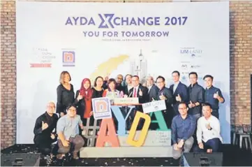  ??  ?? Nippon Paint Malaysia Group team together with the Group’s key partners at the AYDA XChange 2017 10th Anniversar­y Celebratio­n.