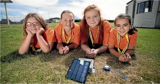  ?? ANDY JACKSON/STUFF ?? Auroa School students Ella McKenna, Sophie van den Brand, Lily Malo and Maddi Goodchap have won a national title for their science project making sound lures to attract predators to traps.