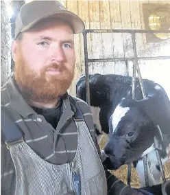  ??  ?? Daniel MacDonald of Glendairy Holsteins Farm in Glengarry, was one of thousands of Canadian Dairy Farmers who woke up Monday to news that their industry will be expected to make concession­s so Canada can sign the new United States-Mexico-Canada Agreement.
