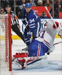  ?? CLAUS ANDERSEN, GETTY IMAGES ?? Auston Matthews is stopped by Habs goalie Carey Price on Saturday in Toronto. Matthews had two goals in the 3-2 overtime loss.