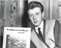  ??  ?? Arthur Spink with one of his albums.