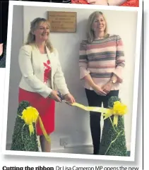  ??  ?? Cutting the ribbon Dr Lisa Cameron MP opens the new wellbeing centre, pictured with manager Heather Malloch