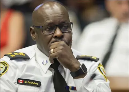  ?? TORONTO STAR FILE PHOTO ?? Toronto Police Chief Mark Saunders listens to deputation­s as members of the public, and others, appear before the police services board to discuss the funding of school resource officers in schools.