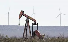  ?? DANIEL ACKER / BLOOMBERG FILES ?? A pumpjack in the Permian Basin near Crane, Tex. U.S. shale output has propelled the country into the world’s top crude producer.