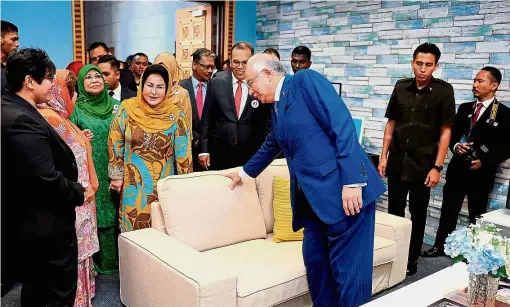  ??  ?? Prime Minister Datuk Seri Najib Tun Razak and his wife Rosmah visiting the Permata Room at the Special Criminal Court in Putrajaya. With them are Minister in the Prime Minister’s Department Datuk Seri Azalina Othman Said (left), Women, Family and...