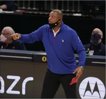  ?? DARRON CUMMINGS — THE ASSOCIATED PRESS ?? With Doc Rivers, seen in the final preseason game against the Indiana Pacers last week, in charge, could the Sixers finally have the right pieces to solve the team’s post-Process championsh­ip puzzle?
