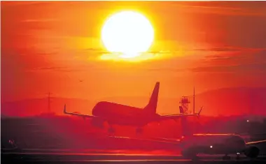  ?? Photo / AP ?? Planes are becoming more energy-efficient but more people are flying more often, meaning airline emissions are soaring.