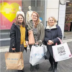  ??  ?? Left: Mum and daughter Sue and Evie Marsden were among the shoppers in Maidstone Right: Bev Palmer, daughter Rebecca Winter and granddaugh­ter Lily Winter
